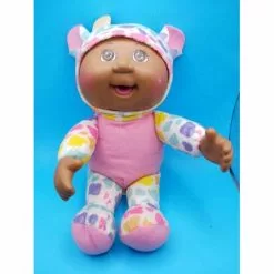 JAZWARES Poupée Parfumée Bout D'chou Cuties 22 Cm – Vache Arc-en-ciel Carter